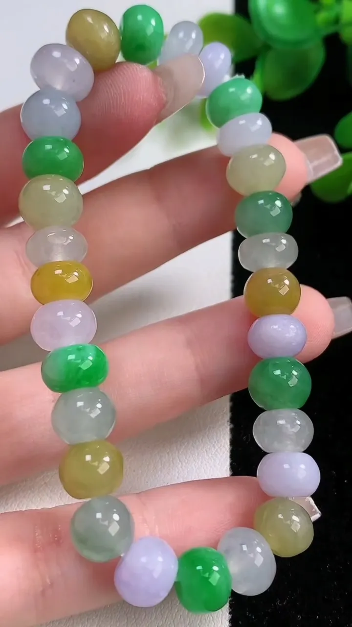 天然A货翡翠三彩算盘珠手串，尺寸9-4.8-29颗，重量:26.18g12月18日
工厂直销收藏佳品,种好水足，色泽均匀，有种有色，上手高大气！