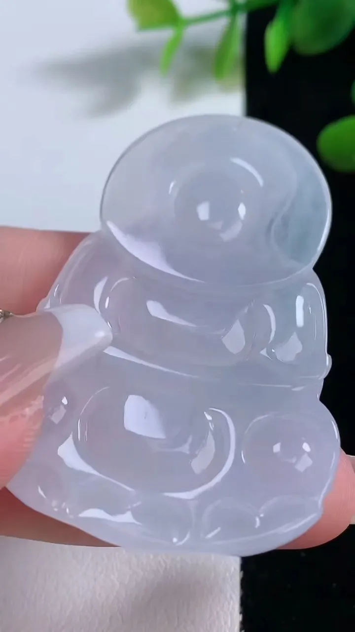 天然A货翡翠紫罗兰观音菩萨吊坠，尺寸55.7-37.2-5.8，重量:21.36g
12月18日