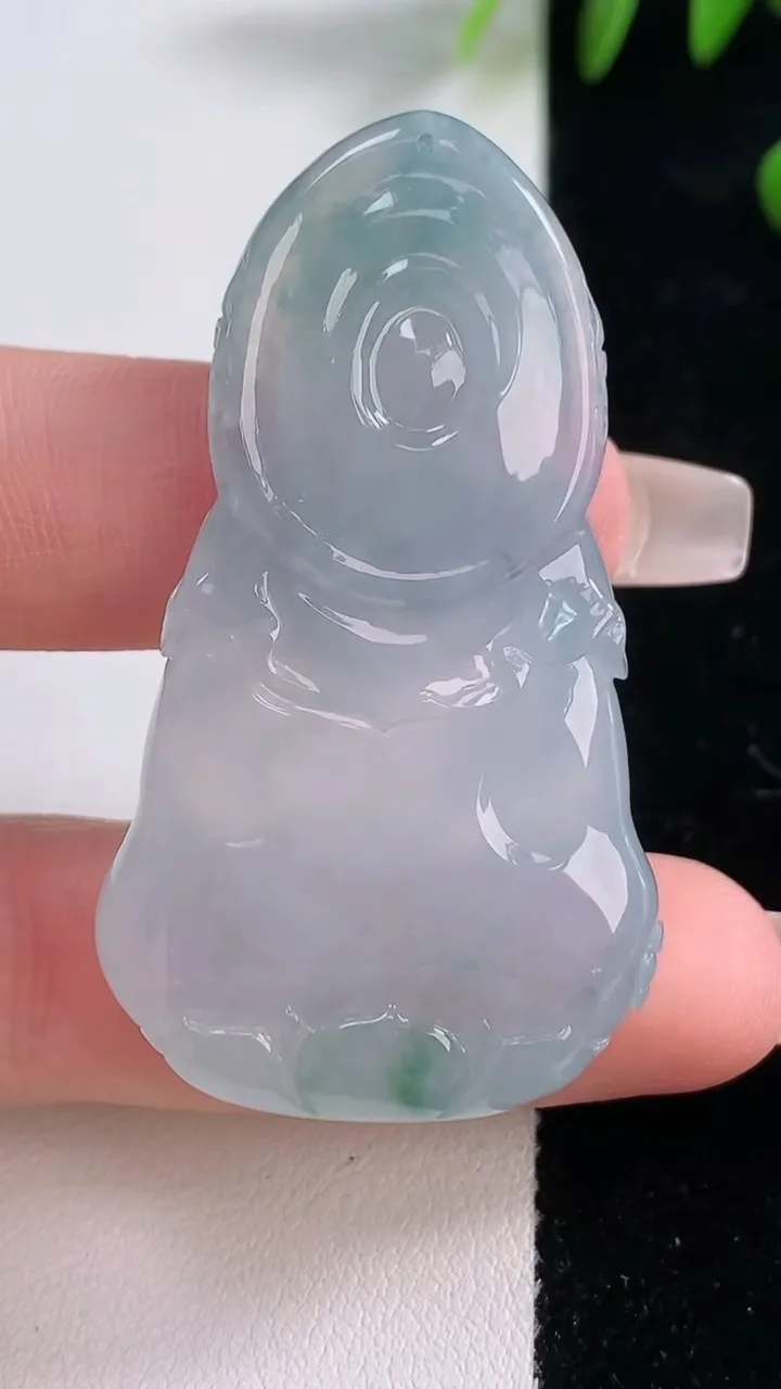 天然A货翡翠种飘花大势至菩萨吊坠，尺寸51.7-29.5-9，重量:25.08g
12月18日