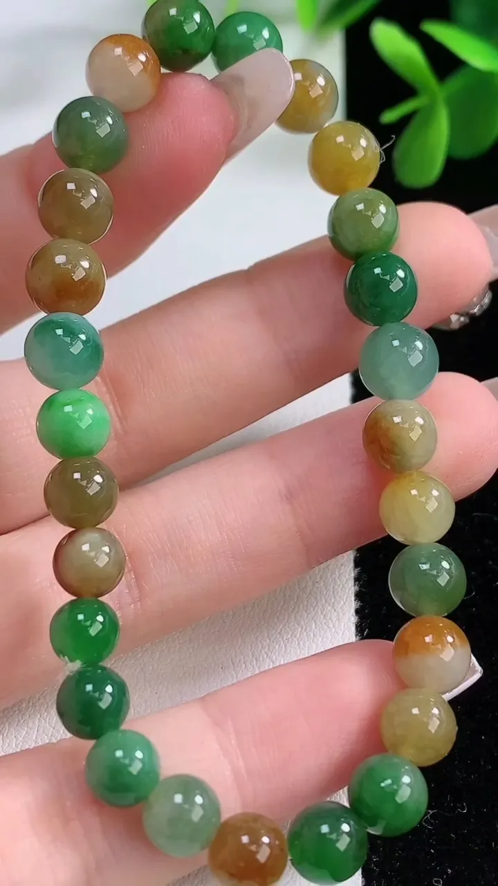 天然A货翡翠双彩圆珠手串，尺寸7.1-27颗，重量:15.43g12月19日
工厂直销收藏佳品,种好