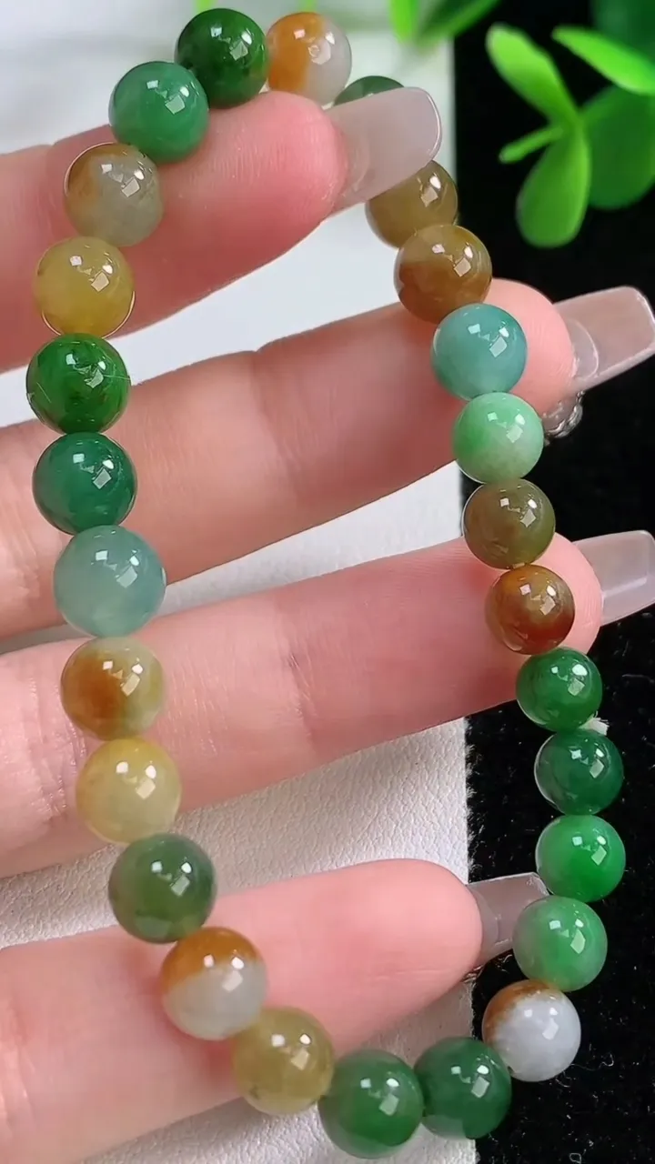 天然A货翡翠双彩圆珠手串，尺寸7.1-27颗，重量:15.43g12月19日
工厂直销收藏佳品,种好水足，色泽均匀，有种有色，上手高大气！