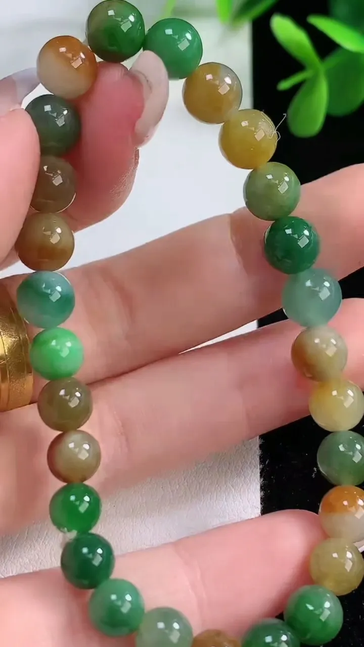 天然A货翡翠双彩圆珠手串，尺寸7.1-27颗，重量:15.43g12月19日
工厂直销收藏佳品,种好