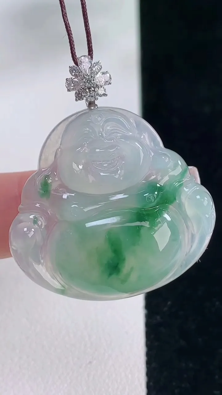 天然A货翡翠种飘花佛公吊坠，尺寸29.5-31.8-5.7，重量:8.27g
12月20日