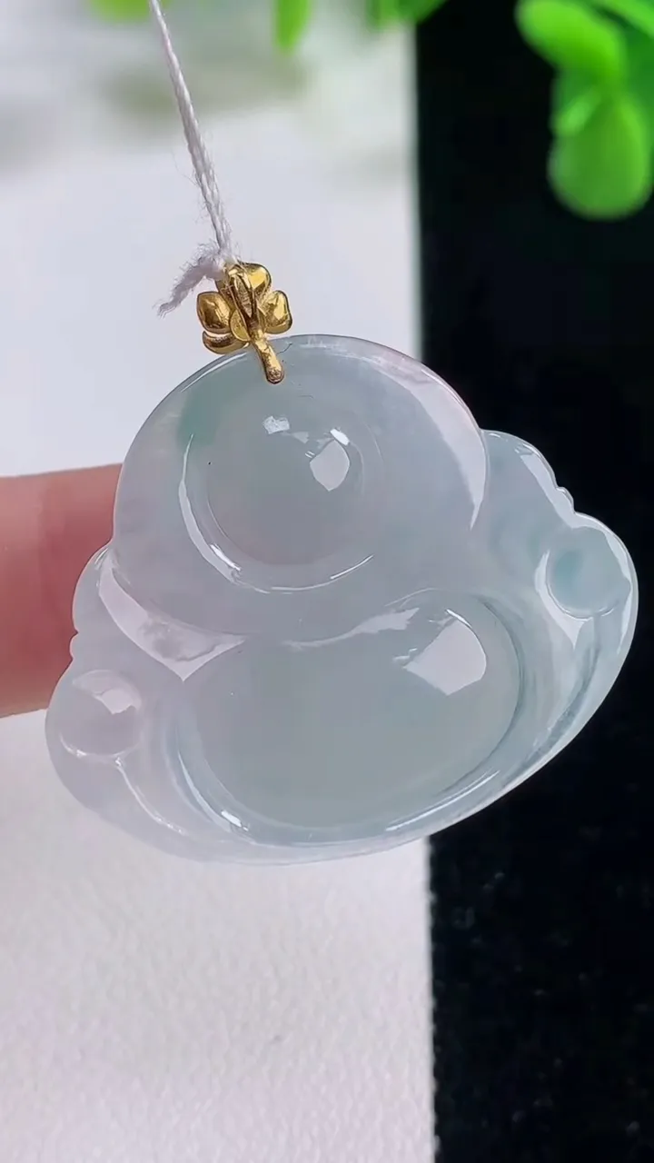 天然A货翡翠种飘花佛公吊坠，尺寸27.7-32.6-6.4，重量:7.78g
12月20日