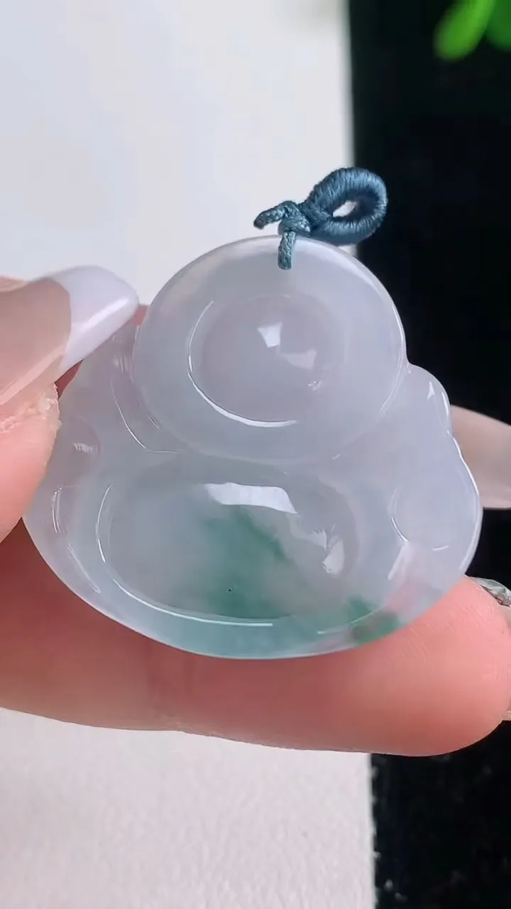 天然A货翡翠飘花佛公吊坠，尺寸29.6-31.4-5.5，重量:7.49g
12月21日