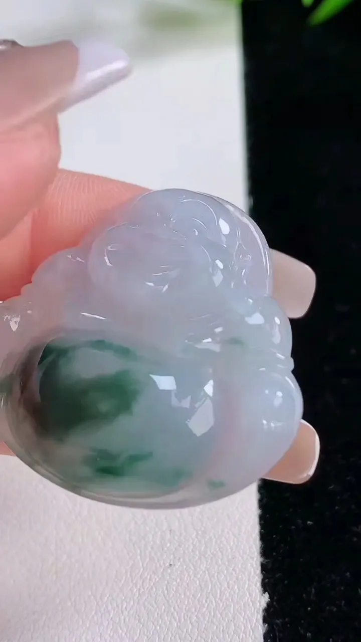 天然A货翡翠飘花佛公吊坠，尺寸32.7-35.3-5.9，重量:10.31g
12月24日