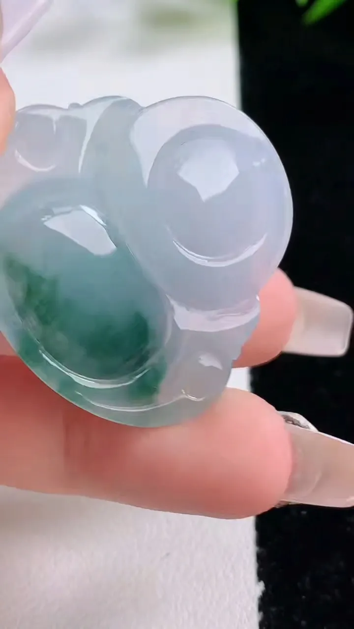 天然A货翡翠飘花佛公吊坠，尺寸32.7-35.3-5.9，重量:10.31g
12月24日