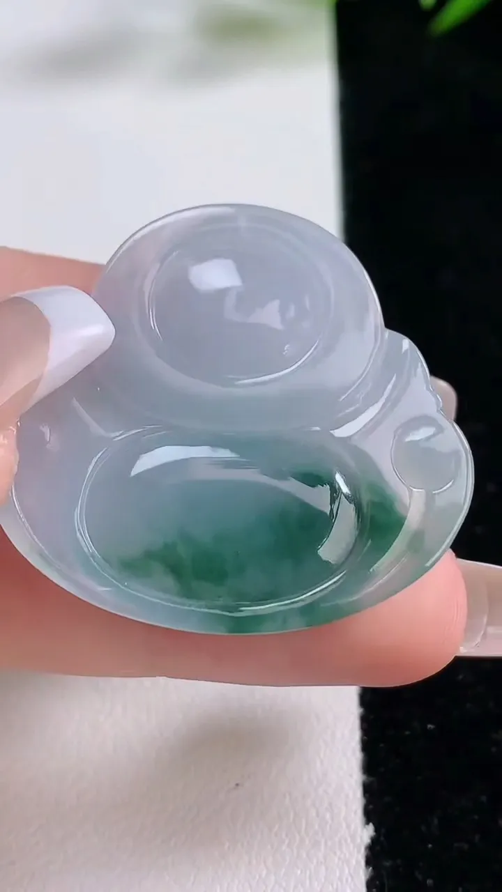 天然A货翡翠飘花佛公吊坠，尺寸32.7-35.3-5.9，重量:10.31g
12月24日