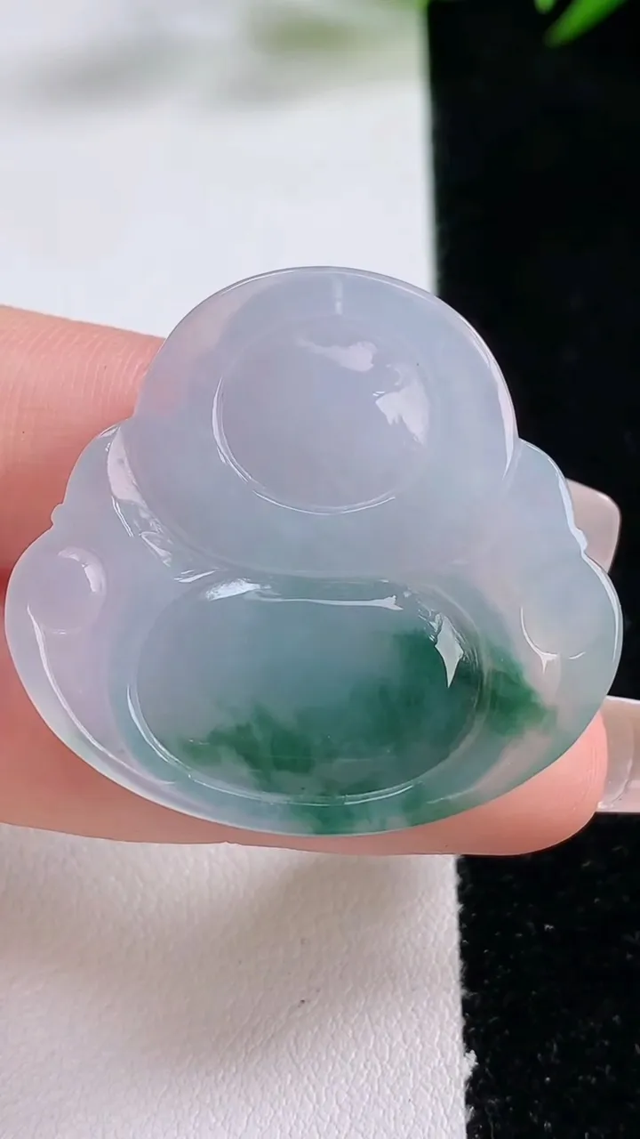 天然A货翡翠飘花佛公吊坠，尺寸32.7-35.3-5.9，重量:10.31g
12月24日