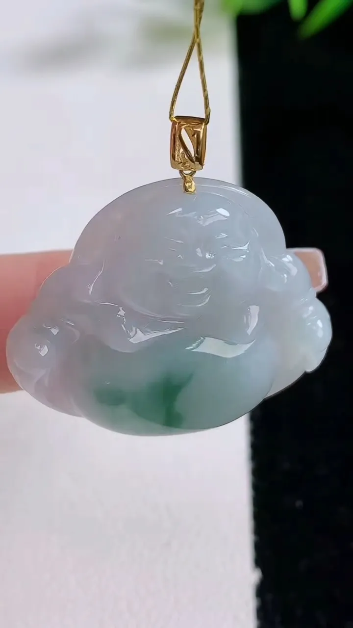 天然A货翡翠18K金飘花佛公吊坠，尺寸27.4-31.5-5.7，重量:7.71g
12月24日