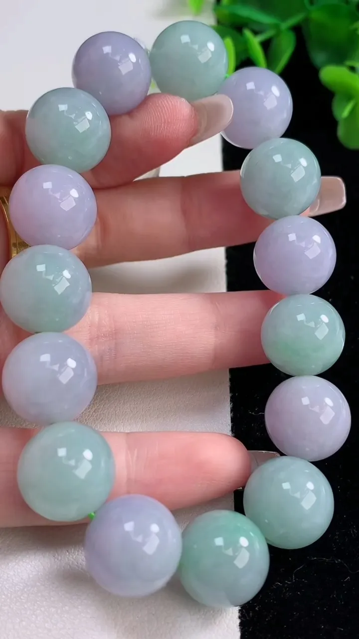 天然A货翡翠双彩紫罗兰圆珠手串，尺寸14.2-15颗，重量:76.40g12月25日
工厂直销收藏佳品,种好水足，色泽均匀，有种有色，上手高大气！