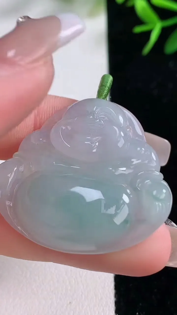 天然A货翡翠飘花佛公吊坠，尺寸32.5-35.8-5.6，重量:9.73g
12月27日