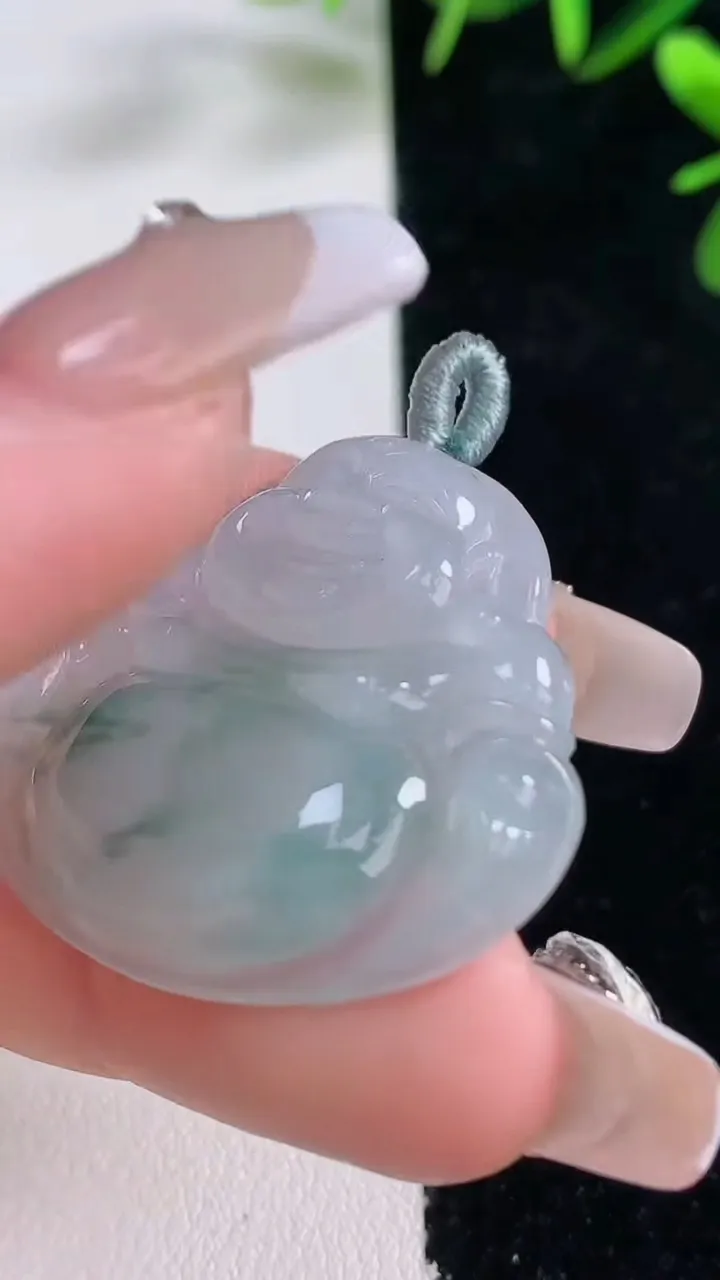 天然A货翡翠冰种飘花佛公吊坠，尺寸31-34.2-5.6，重量:9.46g
12月27日