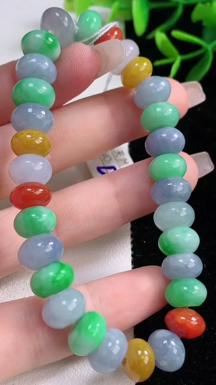 天然A货翡翠四彩算盘珠手串，尺寸9.7-6.2-30颗，重量:34.39g12月27日
工厂直销收藏佳品,种好水足，色泽均匀，有种有色，上手高大气！