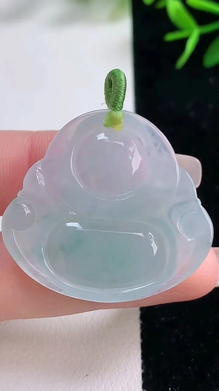 天然A货翡翠飘花佛公吊坠，尺寸32.5-35.8-5.6，重量:9.73g
12月27日