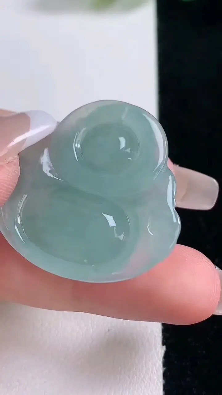 天然A货翡翠佛公吊坠，尺寸32-34.5-5.9，重量:9.58g
12月29日