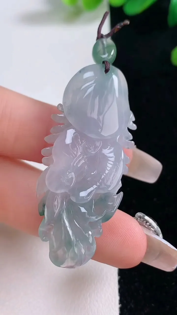 天然A货翡翠飘花凤凰吊坠，尺寸46.2-18.7-9.7，重量:11.79g
12月29日
