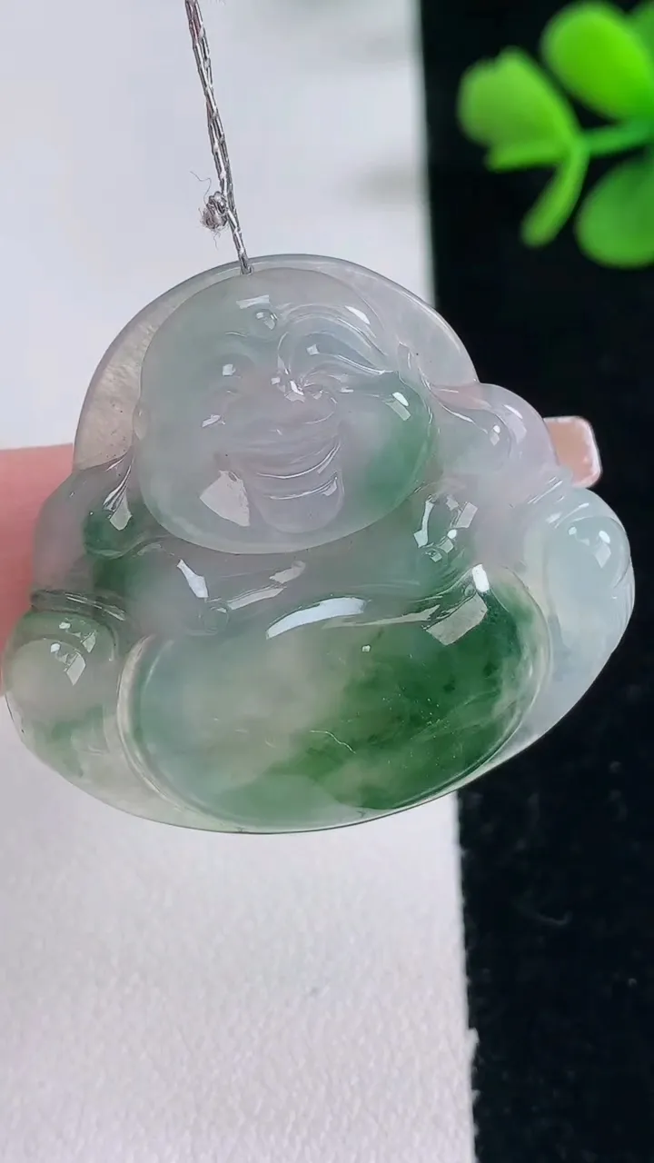 天然A货翡翠种飘花佛公吊坠，尺寸32.6-36-6.2，重量:10.40g
12月30日