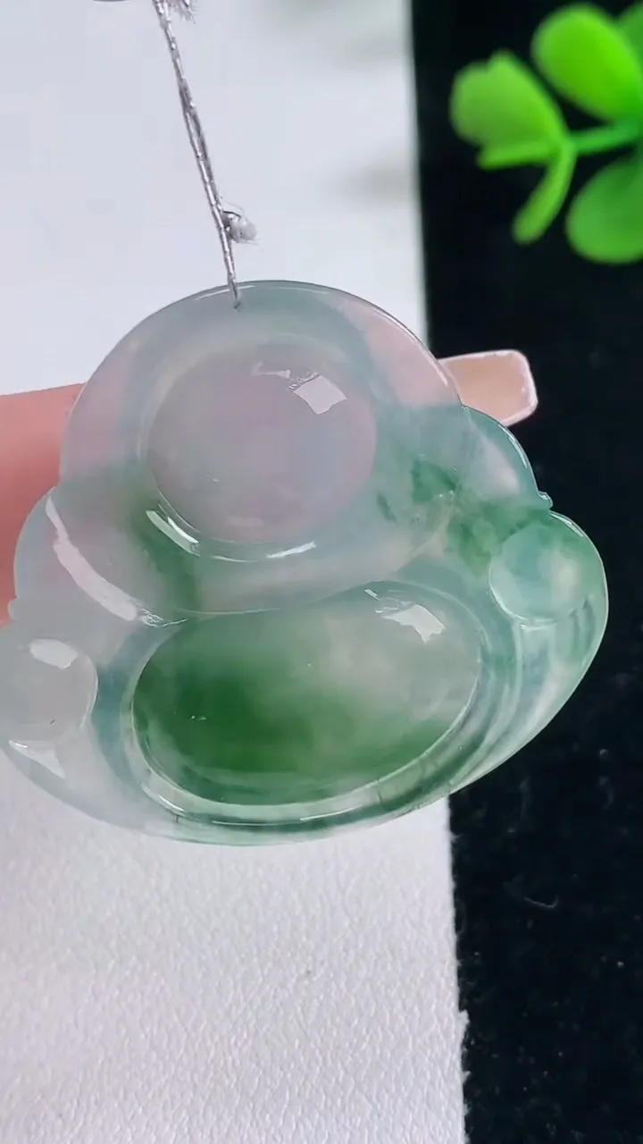 天然A货翡翠种飘花佛公吊坠，尺寸32.6-36-6.2，重量:10.40g
12月30日