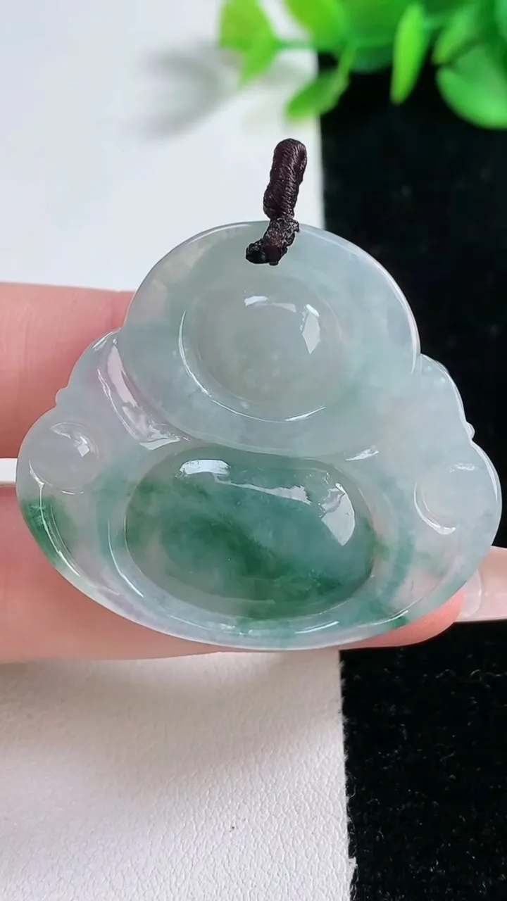 天然A货翡翠冰种飘花佛公吊坠，尺寸36.5-40.8-7.2，重量:15.46g
12月31日