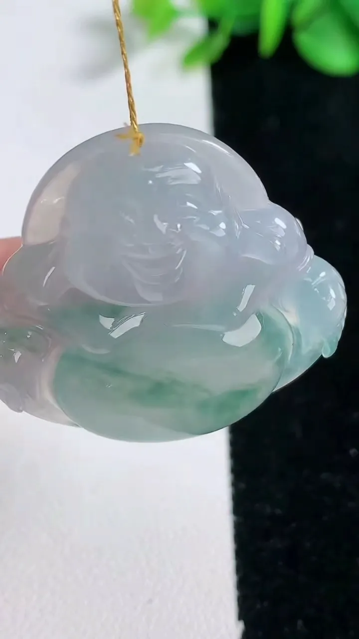 天然A货翡翠种飘花佛公吊坠，尺寸33-35.2-7.3，重量:12.71g
12月31日