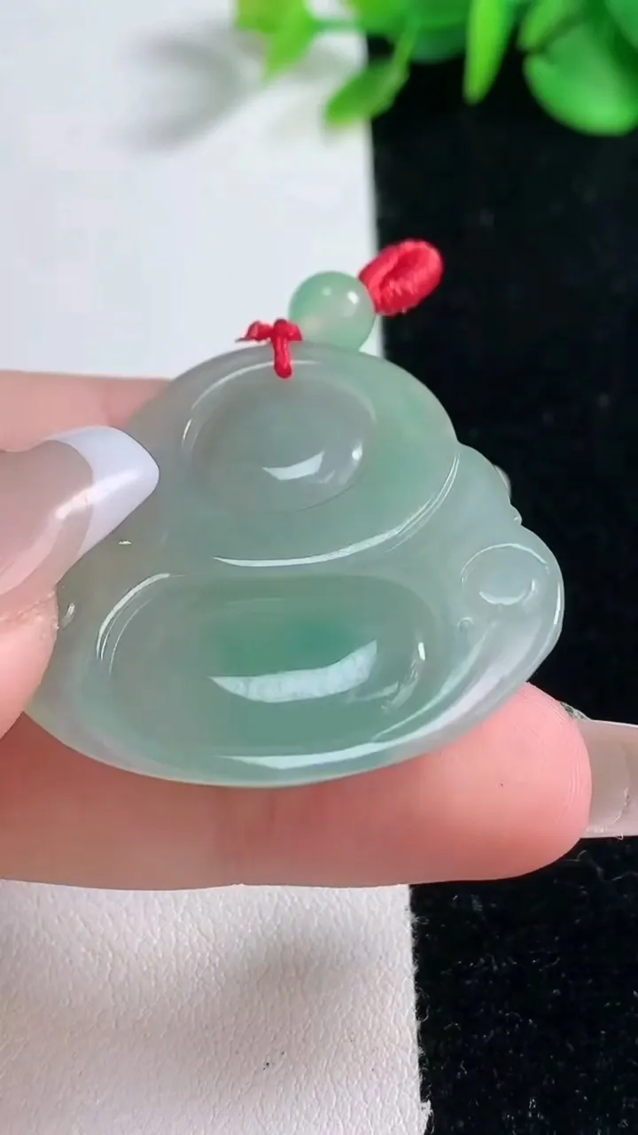 天然A货翡翠佛公吊坠，尺寸34.7-37-5.7，重量:12.35g
12月31日