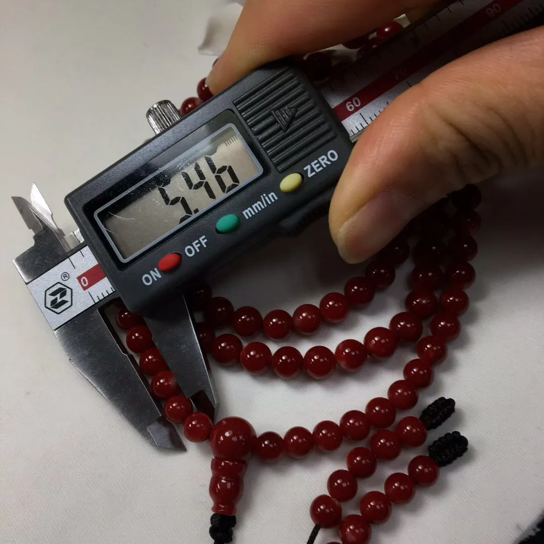 【天然日本阿卡赤血牛血红珊瑚6mm圆珠108粒佛珠链】项链手链两用款！日本产地，阿卡材料，赤血牛血红颜色，光泽柔润透亮，直径约6.14-5.46mm，重量32.51克，珊瑚本为佛教珍宝，来自深海千年生长，有生长纹，属于有机宝石，气场强大，稀少珍贵！每粒均为天然无添加无修补！少虫眼少白芯！收藏精品！传承宝贝！