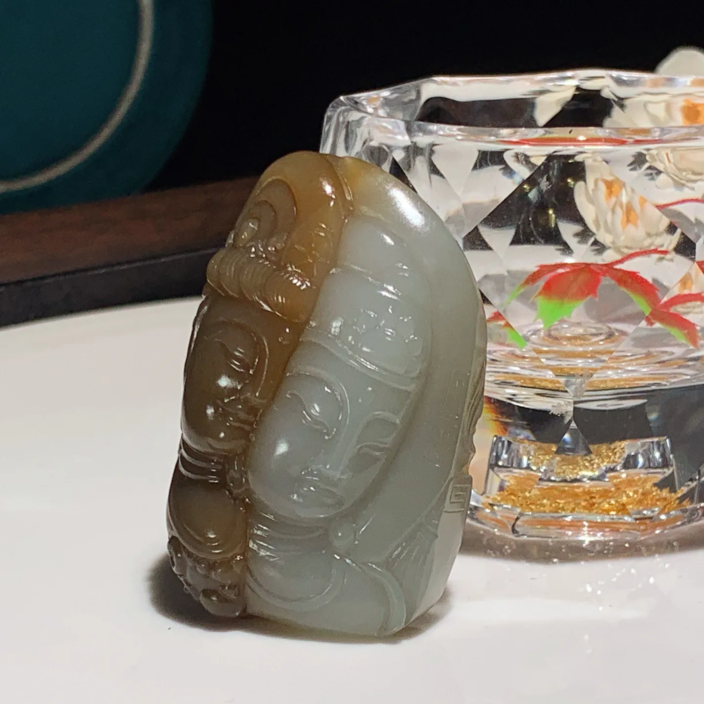 新疆和田玉且末糖观音头挂件。尺寸49/33/17重45.8克。内径玉质细腻油润。手推出油。佩戴高端典