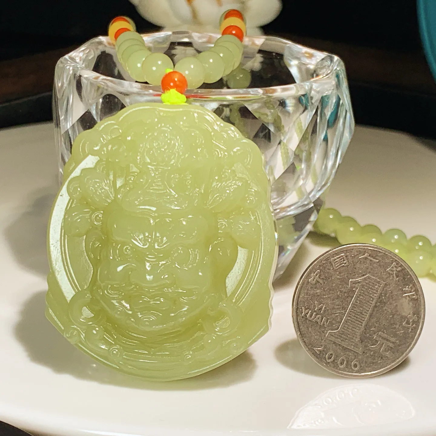 新疆和田玉若羌黄口料不动明王头牌子挂件。尺寸50/42/18重94.8克。内径玉质细腻油润。手推出油。佩戴高端典雅。lt251205