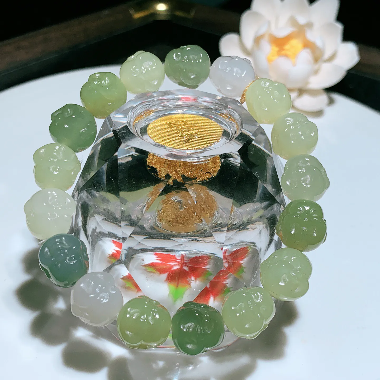 新疆和田玉多宝佛引福来佛头手串。单颗尺寸12/11重37.7克。玉质细腻油润。手推出油。佩戴高端典雅