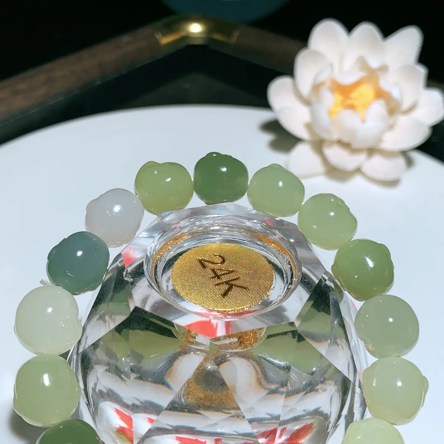 新疆和田玉多宝佛引福来佛头手串。单颗尺寸12/11重37.7克。玉质细腻油润。手推出油。佩戴高端典雅。lt251209