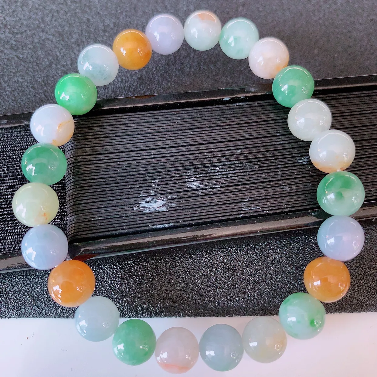 自然光实拍，冰润多宝翡翠手链，多彩翡翠手串，颜色丰富，料子细腻，高档大气，自戴送礼佳品！#46.7取一尺寸7.6mm