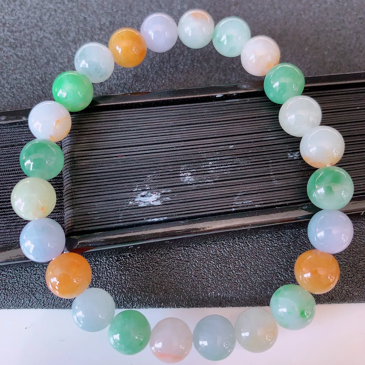 自然光实拍，冰润多宝翡翠手链，多彩翡翠手串，颜色丰富，料子细腻，高档大气，自戴送礼佳品！#46.7取一尺寸7.6mm