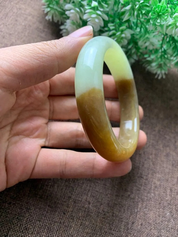 新疆和田玉57.5圈口且末糖料手镯，糖色牛