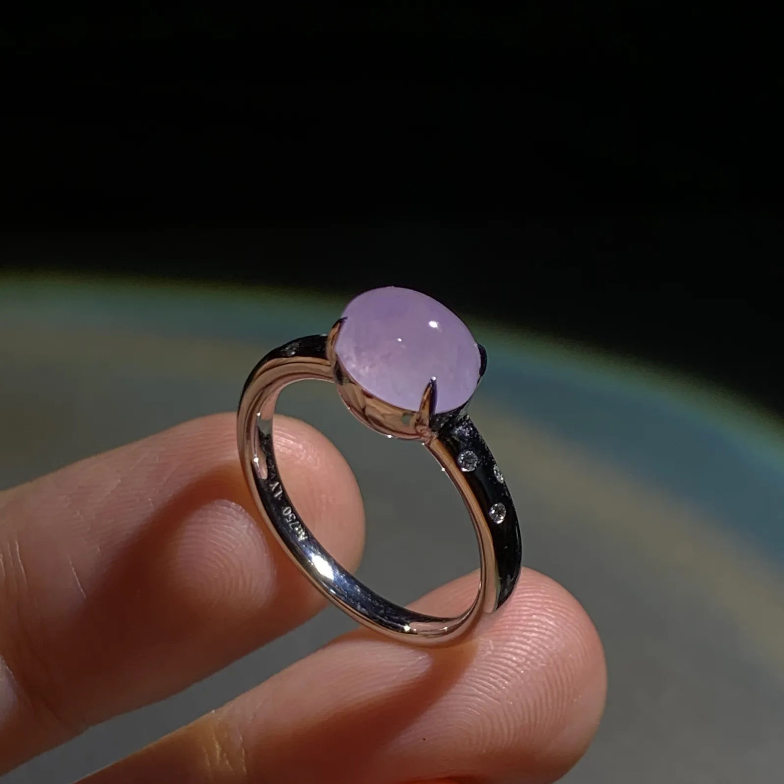 冰紫戒指，裸石8.5-6.8-5mm，
18K金，南非钻，14#，3.43g，