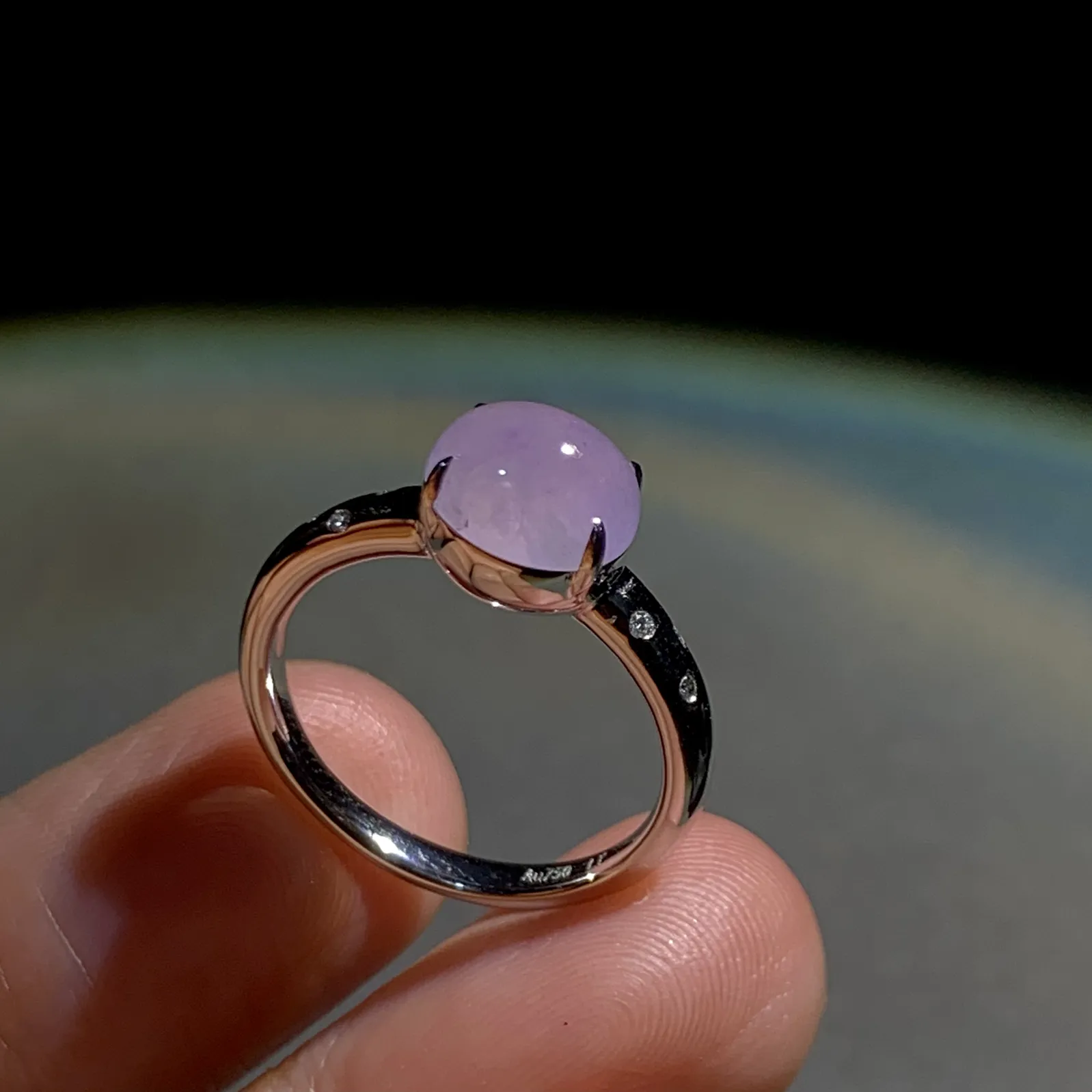 冰紫戒指，裸石8.5-6.8-5mm，
18K金，南非钻，14#，3.43g，