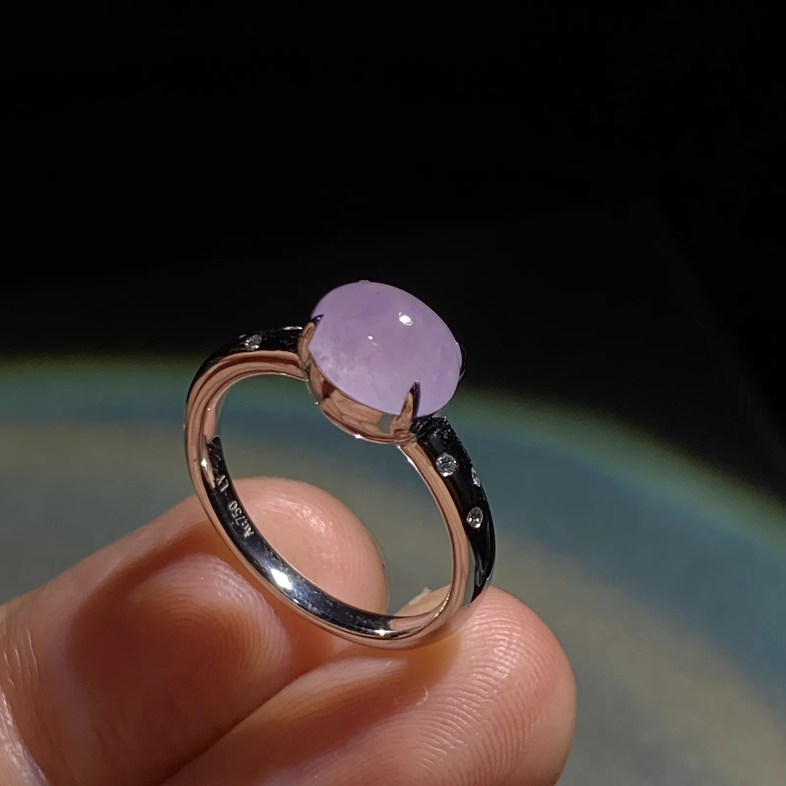 冰紫戒指，裸石8.5-6.8-5mm，
18K金，南非钻，14#，3.43g，