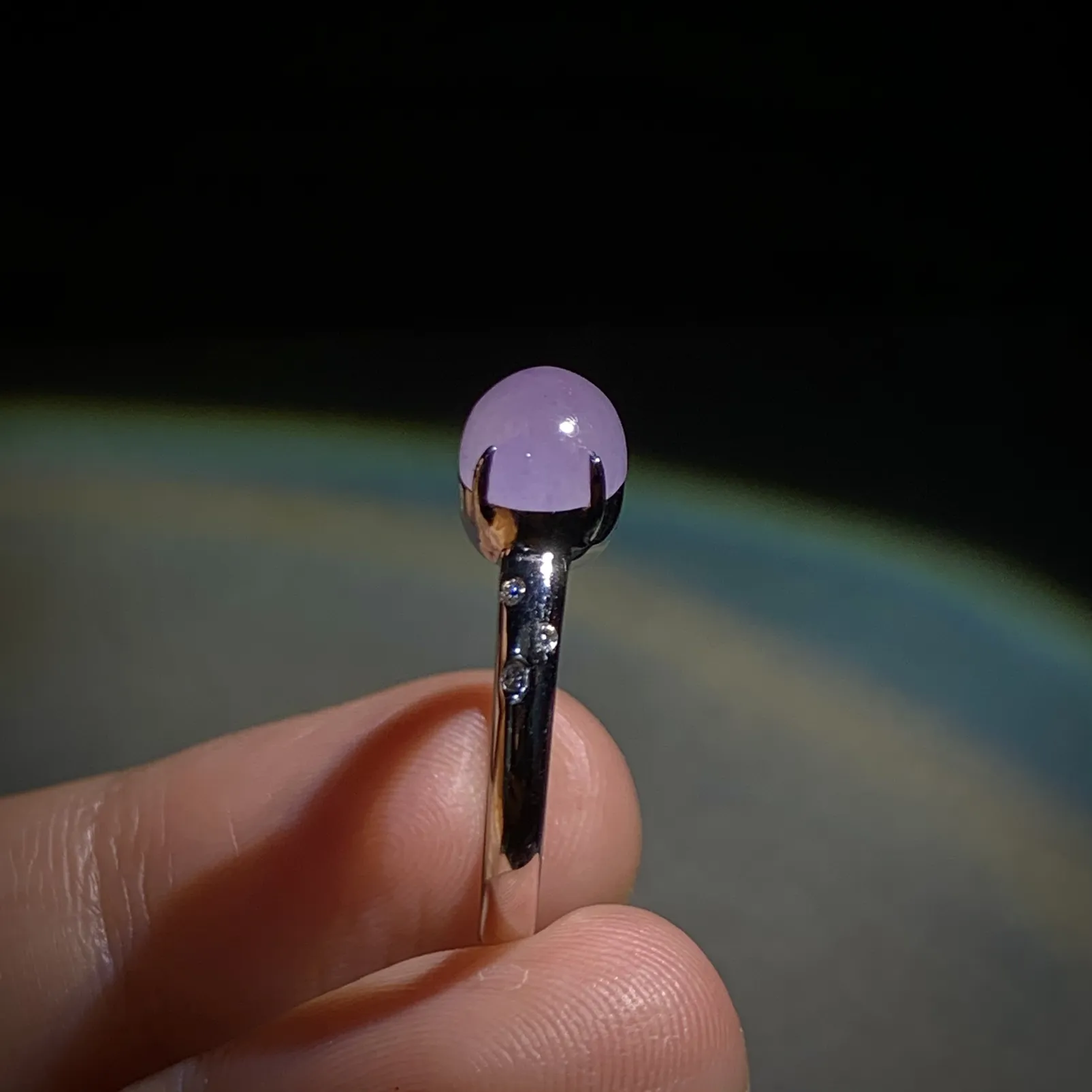 冰紫戒指，裸石8.5-6.8-5mm，
18K金，南非钻，14#，3.43g，