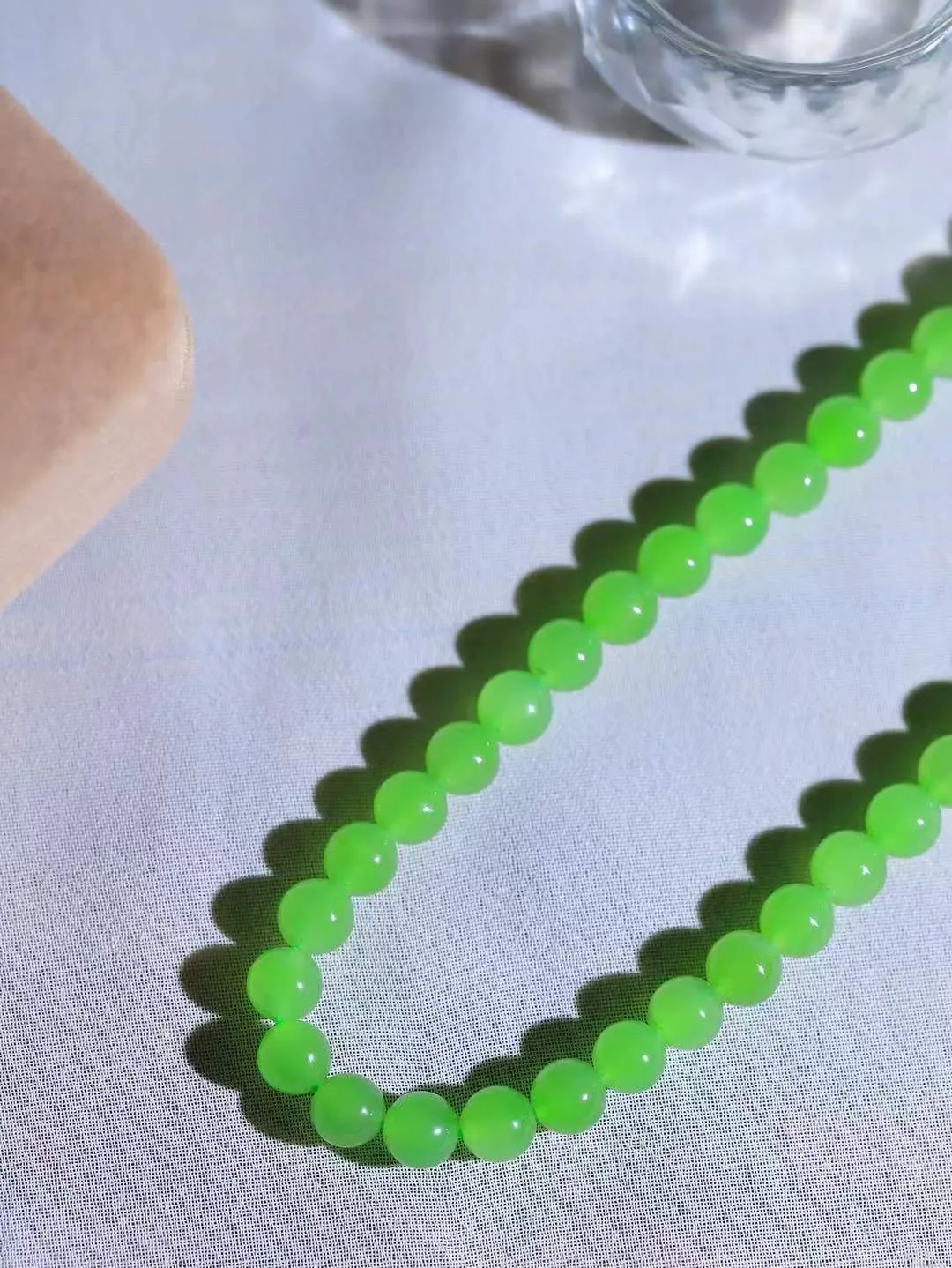 【珠圆玉润.项链】

收藏级臻品️和田玉碧玉珠圆玉润项链 玉质温润细腻  整串打磨圆润，佩戴舒适。珠珠落玉盘，间关莺语花底滑，一生美好时光，无论身在何处，都有它相伴相守。事事顺遂，幸福美满，吉祥如意。重36.41克 尺寸取一5.8mm  791251278A