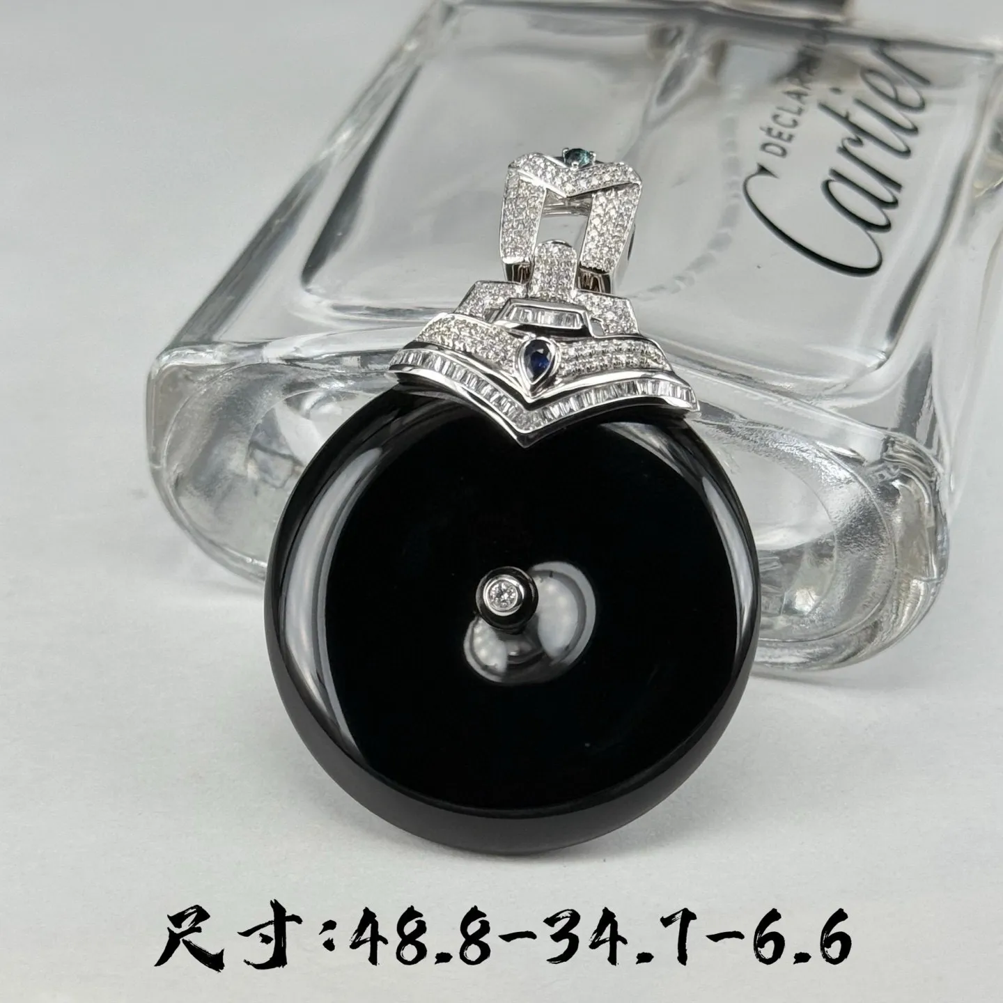 精品18k墨翠平安扣吊坠 种好色正 黑度极好 打灯通透 油性十足  尺寸48.8