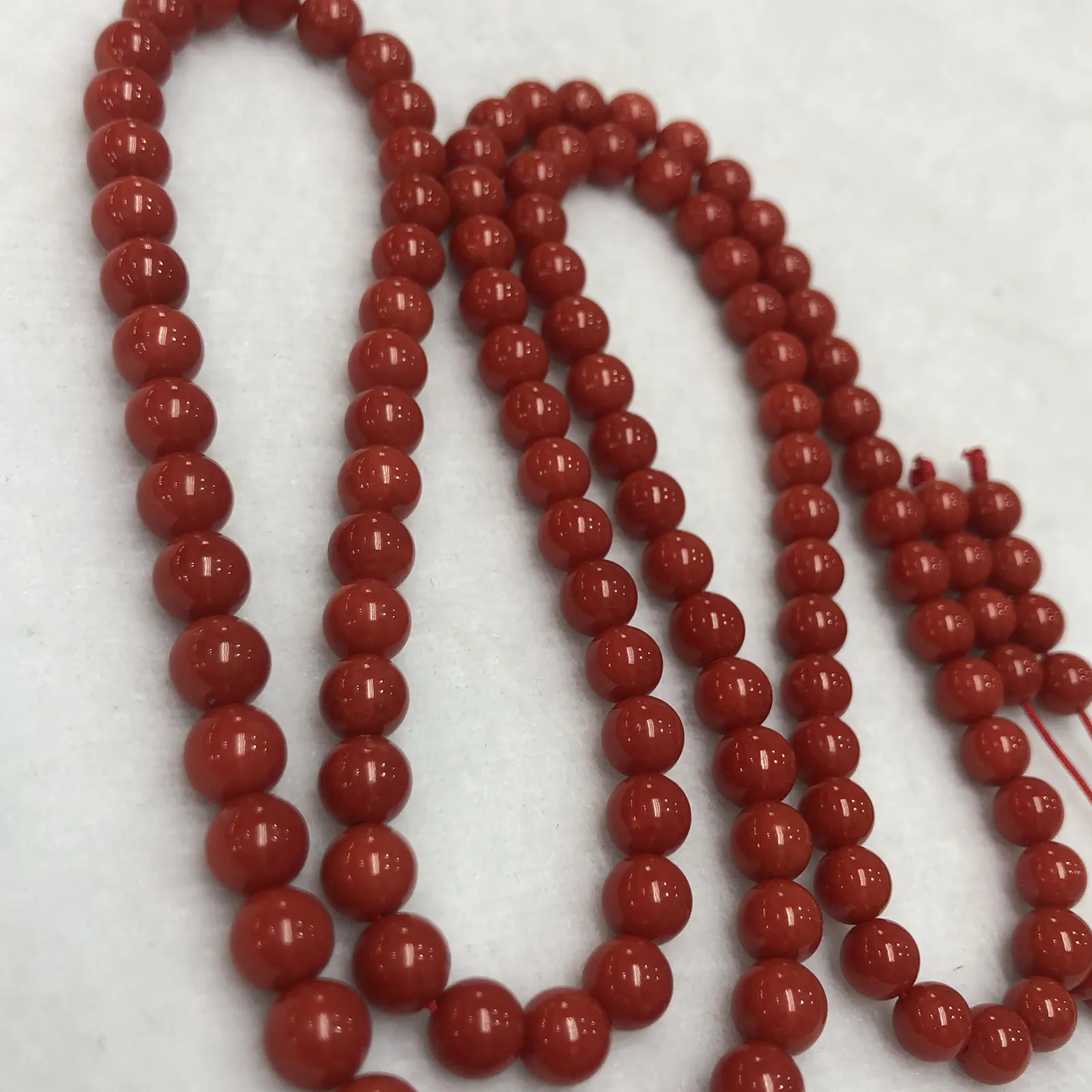 【天然深红珊瑚7mm圆珠108大佛珠串】项链手链两用款！传承精品！意大利产地，沙丁材料，深红颜色，珠子直径7-6.3mm左右！108粒加佛头弟子珠共120粒，可作念佛珠串，每料珠子均为天然珊瑚，珊瑚自古就为佛教珍宝，大师，高僧的喜爱之物！可加持，可守护！深海千年有机宝石，重量为48.55克！
