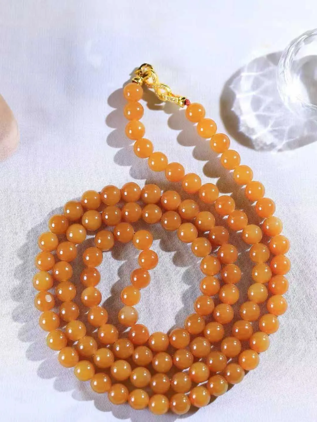 【珠圆玉润.项链】

收藏级臻品️和田玉糖玉珠圆玉润项链 玉质温润细腻  整串打磨圆润，佩戴舒适。珠珠落玉盘，间关莺语花底滑，一生美好时光，无论身在何处，都有它相伴相守。事事顺遂，幸福美满，吉祥如意。重85.2克 尺寸取一7.9mm  791251978A