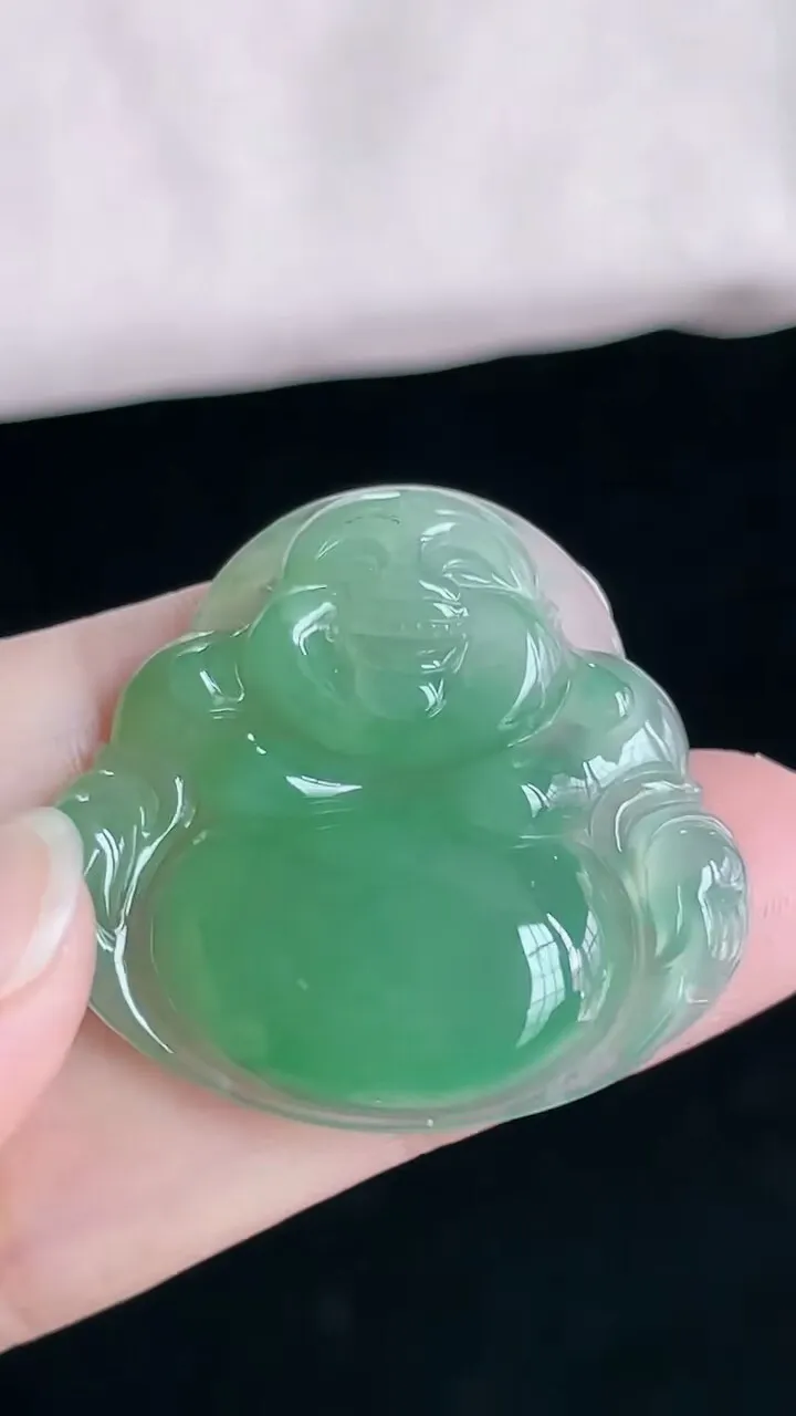 【翡翠名称】老坑种冰满绿佛公翡翠吊坠
【翡翠尺寸】30/32.4/5.5mm
【翡翠描述】宝贝种老水