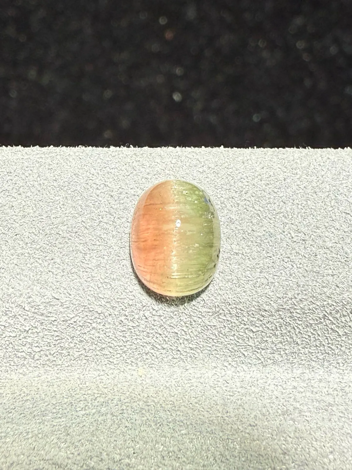 2.22克拉 西瓜碧玺猫眼裸石 猫眼效应犀利 晶体好[强][强] 水头十足 俏色系列可遇不可求 大约规格：8*6.3*4.7mm