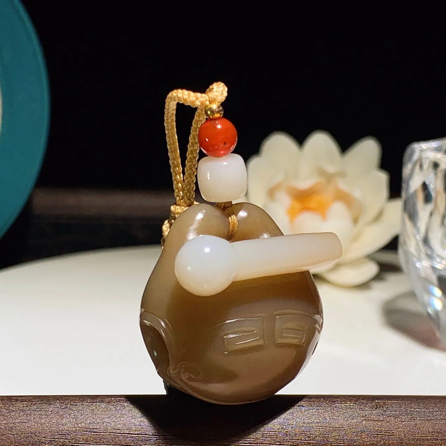 新疆和田玉且末糖木鱼挂件。尺寸32/31/20重28克，玉质细腻油润 底色纯净 脂粉好，品质好！lt251227