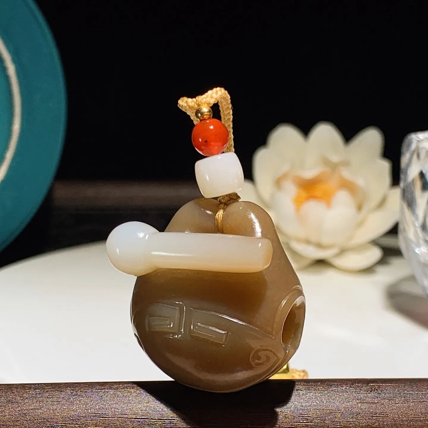 新疆和田玉且末糖木鱼挂件。尺寸32/31/20重28克，玉质细腻油润 底色纯净 脂粉好，品质好！lt251227