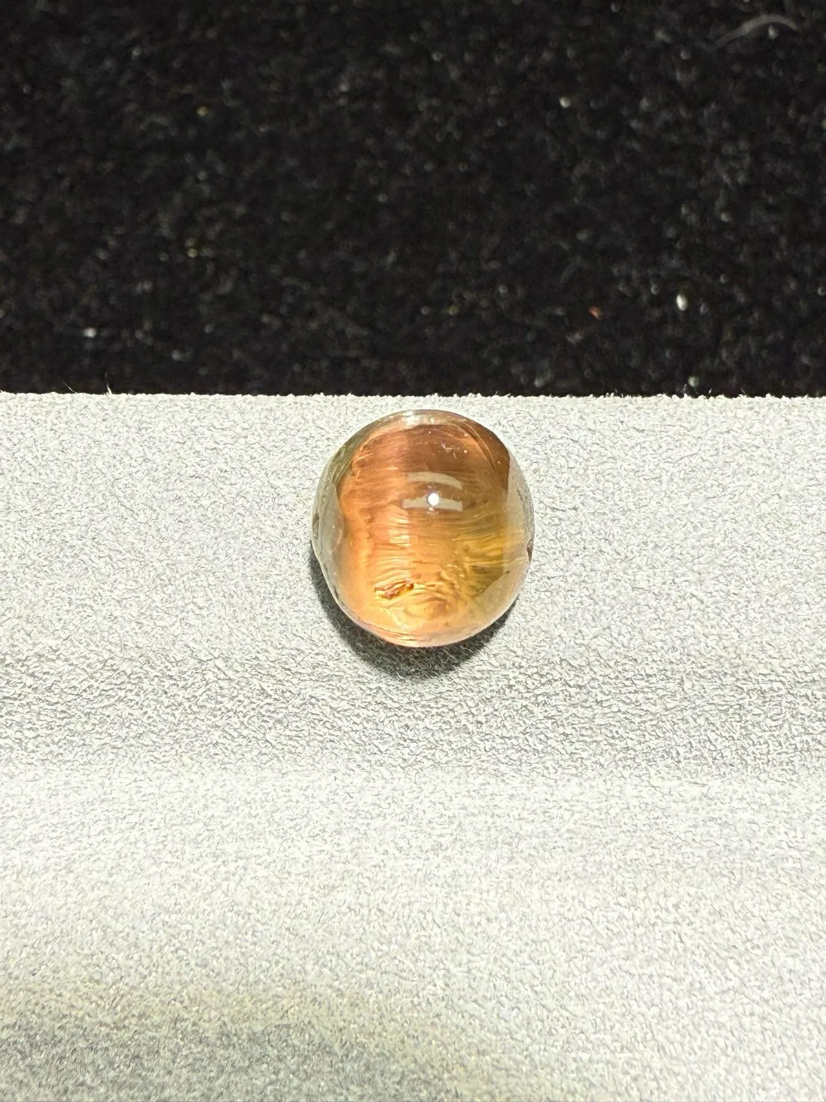 5.23克拉西瓜碧玺蛋面裸石 晶体好[强][强] 水头十足 俏色系列可遇不可求 大约规格：9.5*