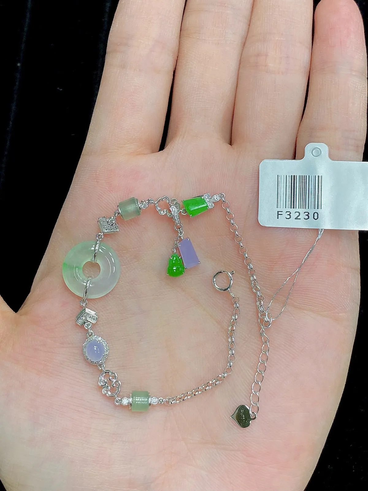 【冰种平安扣+多种元素组合镶嵌手链】颗颗冰透，饱满圆润，光泽闪耀，流行款，18K金钻镶嵌，裸石尺寸12.9*2.8毫米，总长185