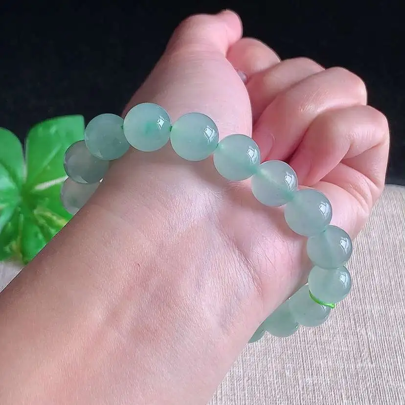 a货翡翠冰种晴水圆珠佛珠手串18颗 尺寸11mm 重量42.44g 1231