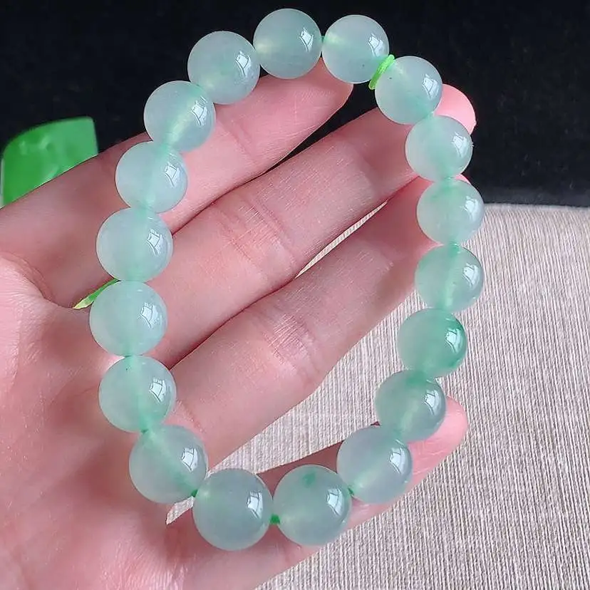 a货翡翠冰种晴水圆珠佛珠手串18颗 尺寸11mm 重量42.44g 1231